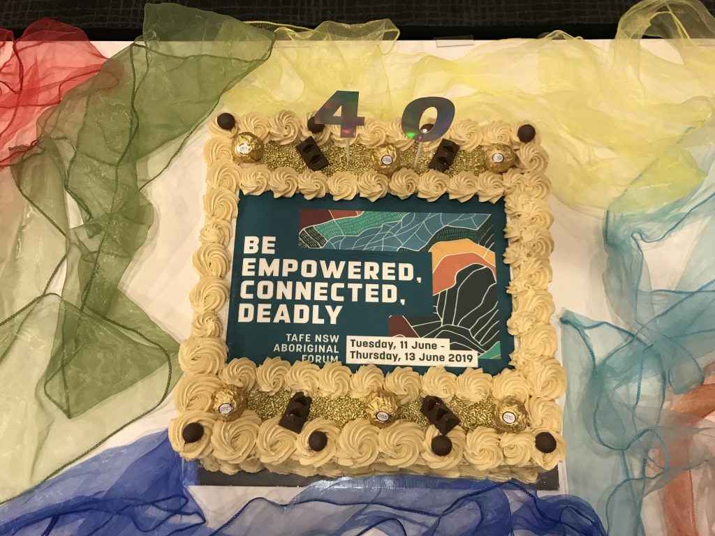  A beautiful cake which says, "Be Empowered, Connected, Deadly."